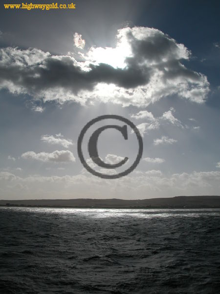 Sun shining through the clouds