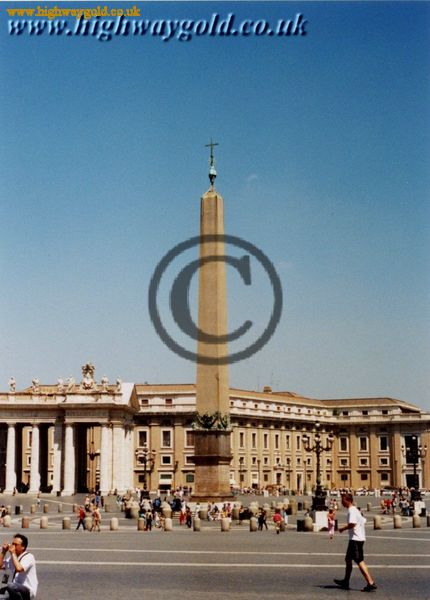 The red granite monolith in front of S. Peter's.